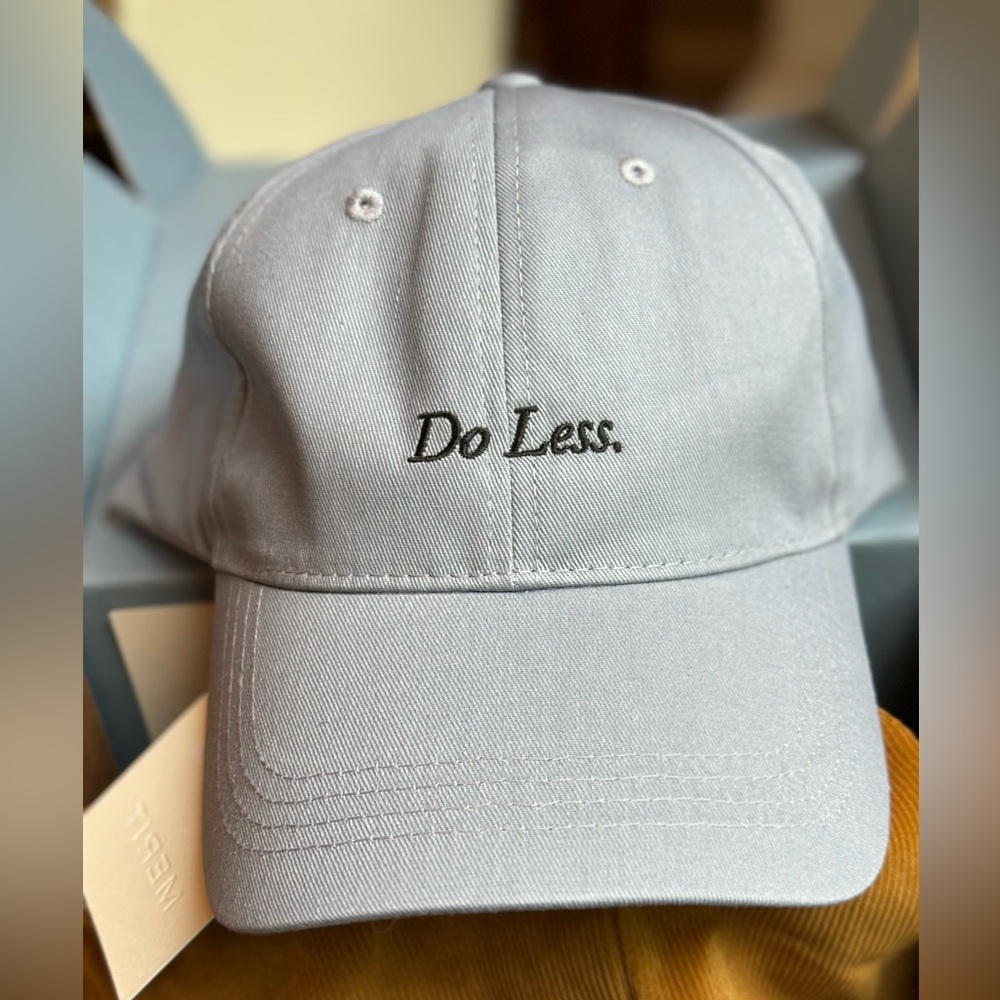 “Do Less” Merit hat, NWT